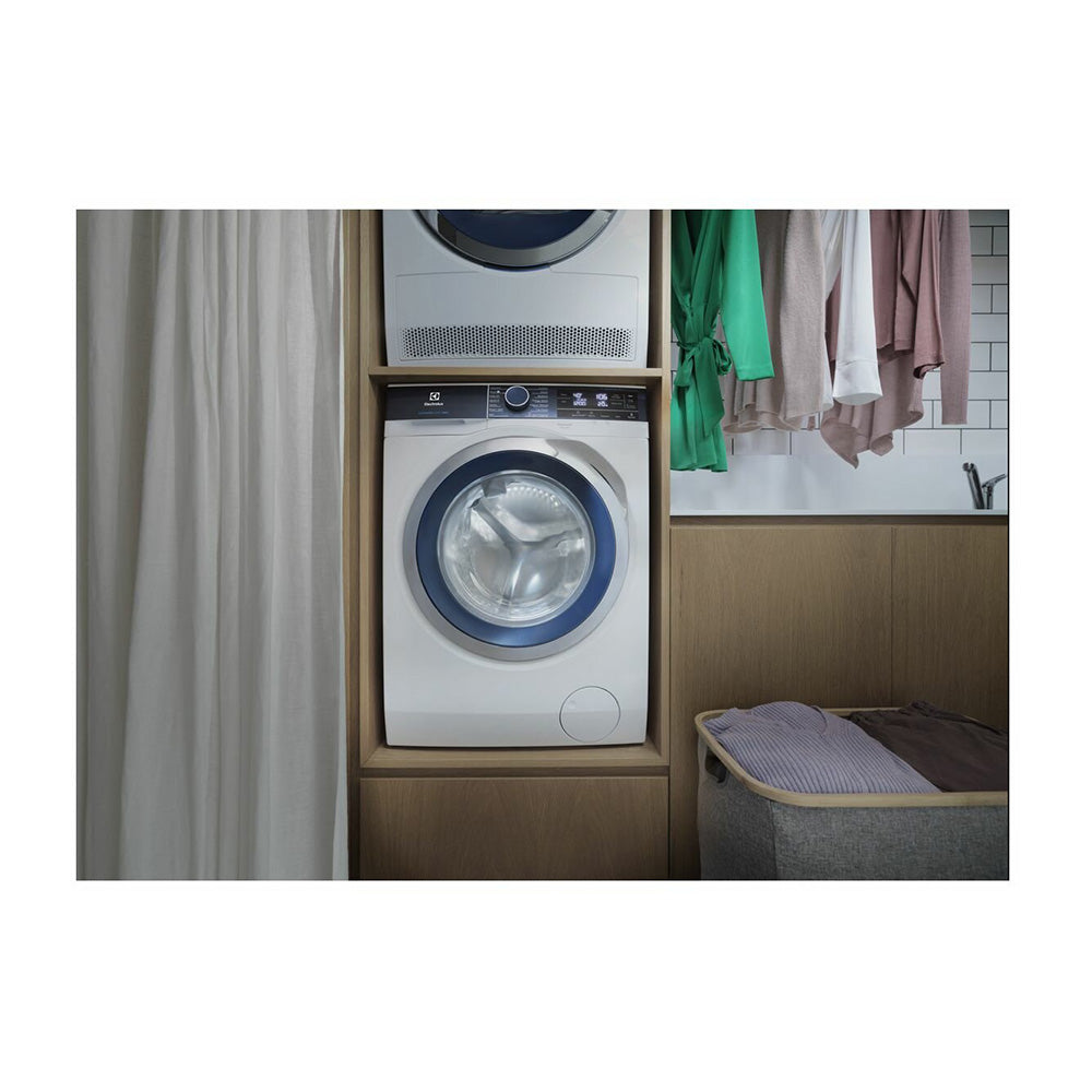 Electrolux 10kg front load washer EWF1042BDWA, Front view in laundry room