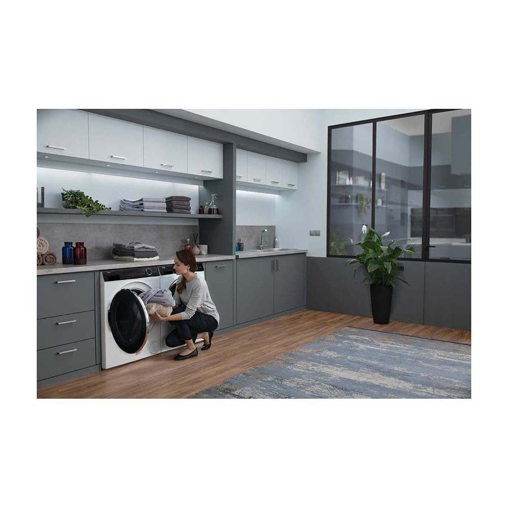 Haier 8kg Front Load Washer with UV Protect HWF80AN1, Front right view in a laundry room 1