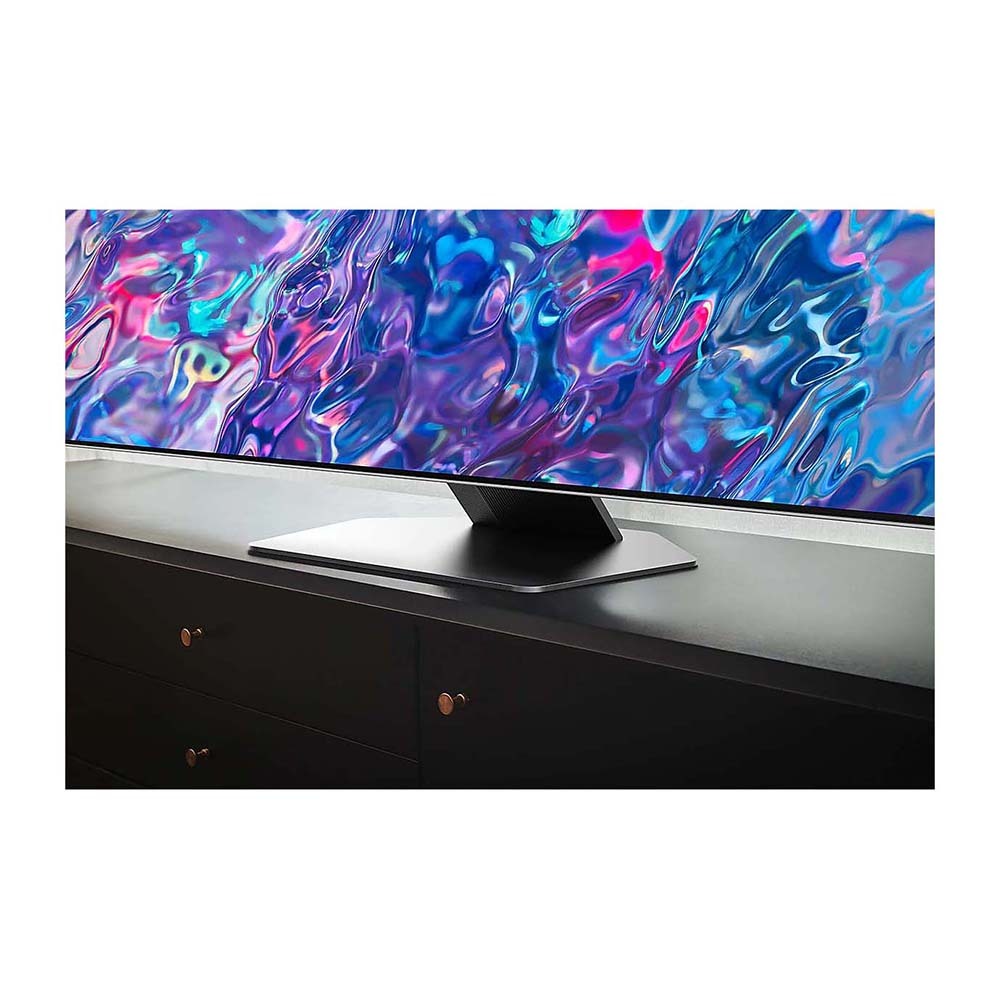 Samsung QA55QN85BAWXXY 55 Inch QN85B Neo QLED 4K Smart TV, Front view on a cabinet