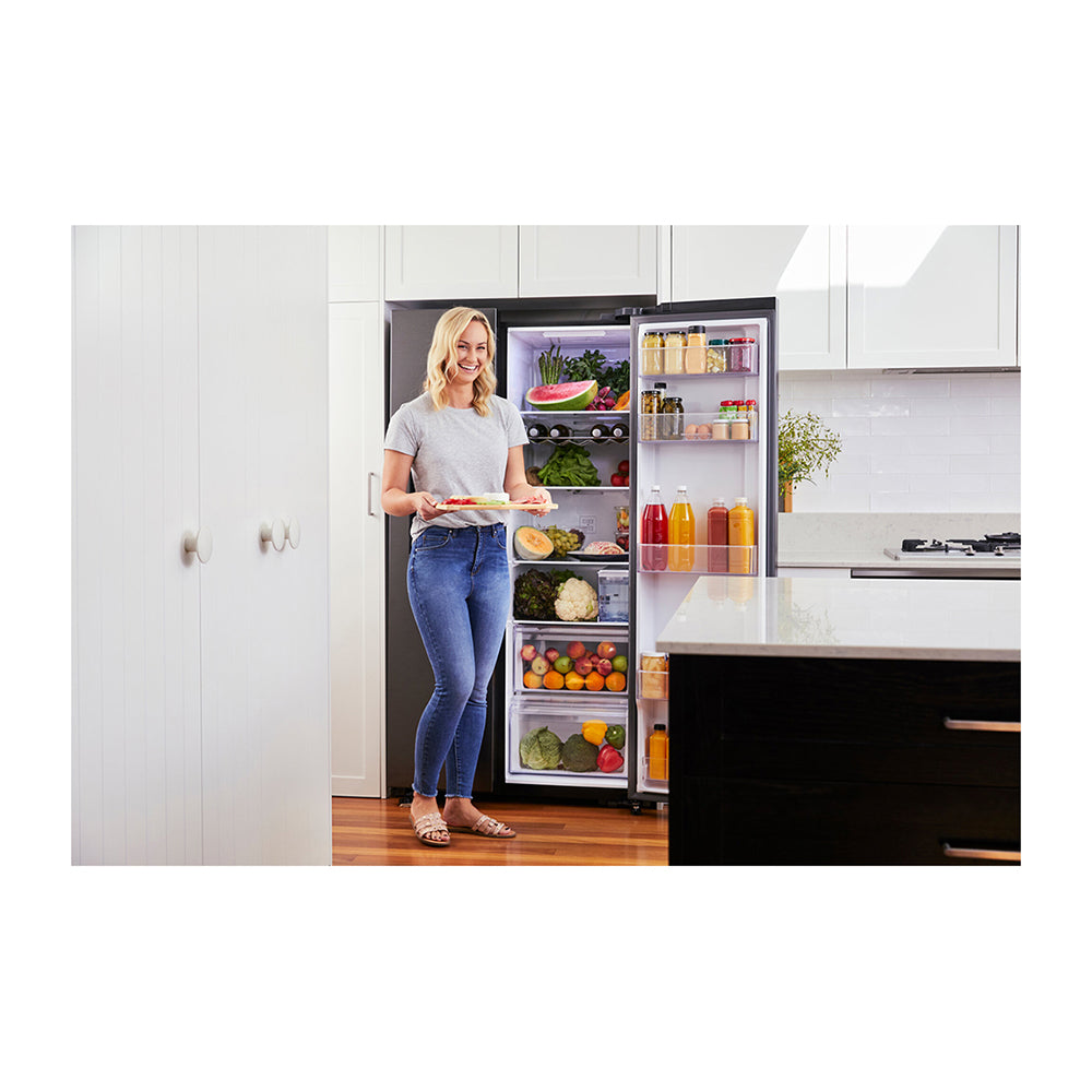 Samsung 635L Side By Side Fridge Black SRS673DMB, Samsung 635L Side By Side Fridge Black SRS673DMB, Front view with single door open, full of food items, and bottles 2